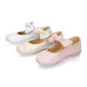 Shiny Canvas Little Mary Jane shoes with hook and loop strap closure with bow.