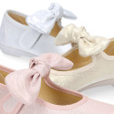 Shiny Canvas Little Mary Jane shoes with hook and loop strap closure with bow.