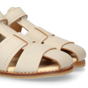 Okaa Flex Kid Sandal shoes to dress in Ivory color. RESPECTFUL model.