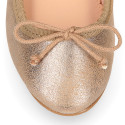 Laminated Soft suede leather girl ballet flats with adjustable ribbon.