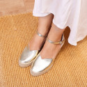 Woman wedge espadrilles shoes with Tulip shape in laminated leather.