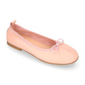 Soft Nappa leather classic girl ballet flats with adjustable ribbon in Nude color.