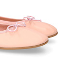 Soft Nappa leather classic girl ballet flats with adjustable ribbon in Nude color.