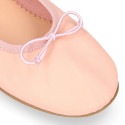 Soft Nappa leather classic girl ballet flats with adjustable ribbon in Nude color.