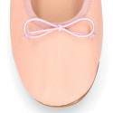 Soft Nappa leather classic girl ballet flats with adjustable ribbon in Nude color.