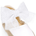 White cotton canvas baby girl espadrille shoes with tulle bow design.