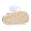 White cotton canvas baby girl espadrille shoes with tulle bow design.