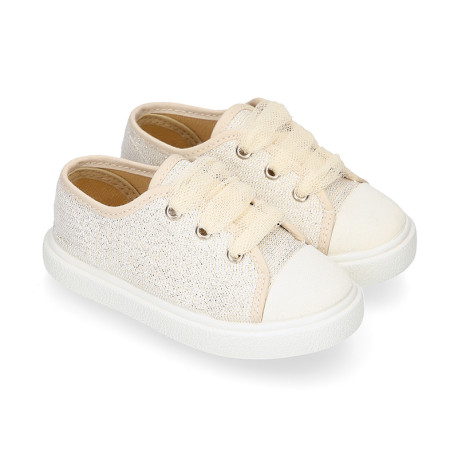 Cotton Canvas OKAA Girl Sneaker laceless and with toe cap design.