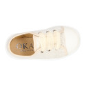 Cotton Canvas OKAA Girl Sneaker laceless and with toe cap design.