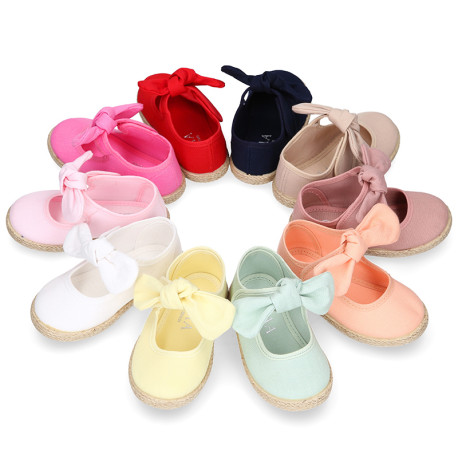 Cotton canvas espadrille shoes little Mary Jane style with hook and loop strap and bow.