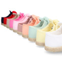 Cotton canvas espadrille shoes little Mary Jane style with hook and loop strap and bow.