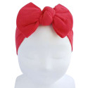 Wide baby turban with knotted bow.