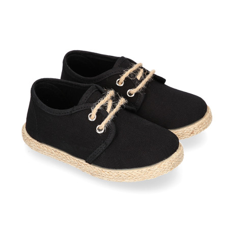 Kids laces up shoes espadrille style in black cotton canvas to dress.