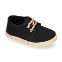 Kids laces up shoes espadrille style in black cotton canvas to dress.