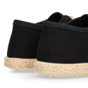 Kids laces up shoes espadrille style in black cotton canvas to dress.