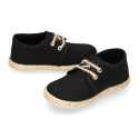 Kids laces up shoes espadrille style in black cotton canvas to dress.