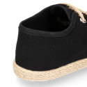 Kids laces up shoes espadrille style in black cotton canvas to dress.