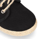 Kids laces up shoes espadrille style in black cotton canvas to dress.