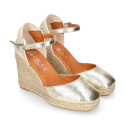 Woman wedge espadrilles shoes with square toe cap in laminated leather.