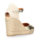 Woman wedge espadrilles shoes with square toe cap in laminated leather.