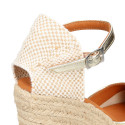 Woman wedge espadrilles shoes with square toe cap in laminated leather.