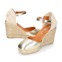 Woman wedge espadrilles shoes with square toe cap in laminated leather.