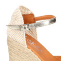 Woman wedge espadrilles shoes with square toe cap in laminated leather.