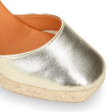 Woman wedge espadrilles shoes with square toe cap in laminated leather.