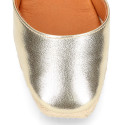 Woman wedge espadrilles shoes with square toe cap in laminated leather.