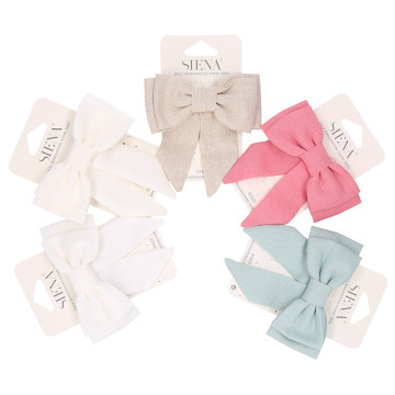 Girl bow hair clip in linen for Ceremony.