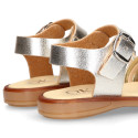 Laminated leather girl sandal shoes with braided design in gold color.