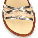 Laminated leather girl sandal shoes with braided design in gold color.