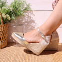 Woman wedge espadrilles shoes with square toe cap in laminated leather.