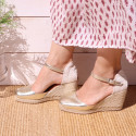 Woman wedge espadrilles shoes with square toe cap in laminated leather.