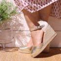 Woman wedge espadrilles shoes with square toe cap in laminated leather.