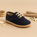 Linen canvas combined with suede leather Oxford style espadrille shoes in natural color.