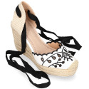 Women's open-back espadrille with wedge and flowers design.