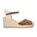 Women's open-back espadrille with wedge and leopard print design.