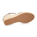 Women's open-back espadrille with wedge and leopard print design.
