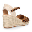 Women's open-back espadrille with wedge and leopard print design.