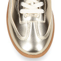Deportiva moda mujer con cordones en color oro