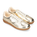 Deportiva moda mujer con cordones en color oro