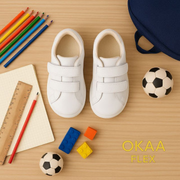 Deportiva colegial niños pequeños sin cordones en piel lavable.