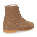 New girl Pascuala style boots in suede leather with perforated design.