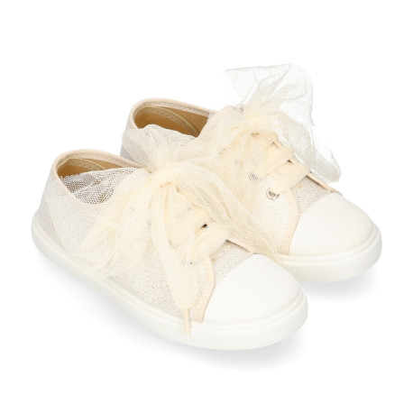 Zapatilla niña ceremonia con cordones en tul en lona con brillos.