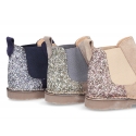 New suede leather ankle boots with MELANGE GLITTER.