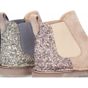 New suede leather ankle boots with MELANGE GLITTER.