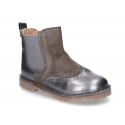 Combined leather kids ankle boots with elastic band and thick outsole.