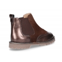 Combined leather kids ankle boots with elastic band and thick outsole.