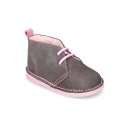 Suede leather kids safari boots with shoelaces and fake hair lining.